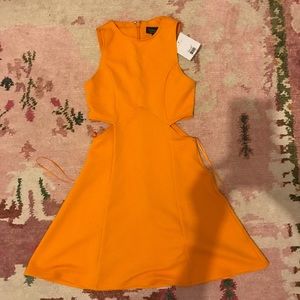 Sleeveless yellow cut out dress